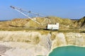 Largest Walking Dragline Excavator in the chalk quarry. Big Muskie in open pit mining. Mining Dragline. Heavy mining industry and Royalty Free Stock Photo
