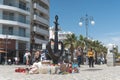 Larnaca, Cyprus - April 16, 2022: Anchor-heart monument donated by Odessa city is surrounded by toys commemorating Ukrainian