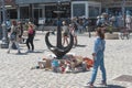 Larnaca, Cyprus - April 15, 2022: Anchor-heart monument donated by Odessa city is surrounded by toys commemorating Ukrainian