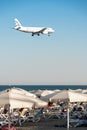 Larnaca, Cyprus - July 17, 2022: Airbus A320-232 of Aegean Airlines landing over Mackenzie beach at Glafcos Clerides airport