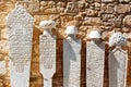 LARNACA, CYPRUS, MARCH, 2019: Tombstones of Turkish commanders in the fort of Larnaca. Some unknown writings on white stones. Old