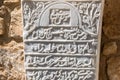 LARNACA, CYPRUS, MARCH, 2019: Tombstones of Turkish commanders in the fort of Larnaca. Some unknown writings on white stones. Old