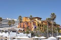 View of the luxury hotels surrounded by palm trees and a long promenade in Las Americas, Tenerife, Canary Islands, Spain Royalty Free Stock Photo