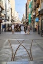 Old train rails at the main shopping street Calle Triana