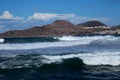 Powerful waves are breaking along Las Canteras town beach, brought by a winter storm Clement Royalty Free Stock Photo