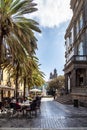 Las Palmas, Spain - Feb 22, 2023: Small pedestrian cobblestone street in Vegueta. Las Palmas, Gran Canaria, Spain