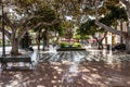 Las Palmas, Spain - Feb 22, 2023: Small pedestrian cobblestone street in Vegueta. Las Palmas, Gran Canaria, Spain