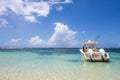 Dramatic image of a tourist fishing boat anchored off the caribbean coast of the dominican republic. Royalty Free Stock Photo