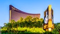 The modern building with tinted glass walls of the Wynn Resort and Casino on Las Vegas Boulevard, also called The Strip