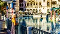 Tourists enjoying Gondola Ride at The Venetian Resort and Casino at the center of The Strip in Las Vegas