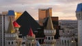 LAS VEGAS, NEVADA USA - 4 MAR 2020: Excalibur castle and Luxor pyramid casino uncommon aerial view. Plane flying from McCarran