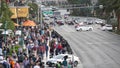 LAS VEGAS, NEVADA USA - 5 MAR 2020: People on pedestrian walkway. Multicultural men and women walking on city promenade. Crowd of