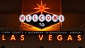 LAS VEGAS, NEVADA USA - 9 MAR 2020: Welcome to fabulous Sin City illuminated retro neon sign inside McCarran airport. Iconic