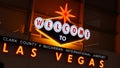 LAS VEGAS, NEVADA USA - 9 MAR 2020: Welcome to fabulous Sin City illuminated retro neon sign inside McCarran airport. Iconic