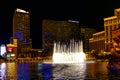 Las Vegas Strip at night. Street view, hotels, traffic, city life. Las Vegas Bellagio Hotel and Caesars Palace, and water fountain Royalty Free Stock Photo