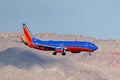 Southwest Airlines Boeing 737 airliner on approach to land at McCarran International Airport in Las Vegas at night