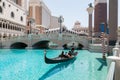 Las Vegas, Nevada, USA - September 1, 2017: Tourists enjoying ride in gondola at Grand Canal by the bridge at The Venetian Resort