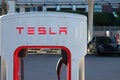 Tesla Car Public EV Charging Station Lot During the Day