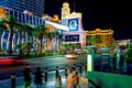 Las Vegas Strip at night. Street view, hotels, traffic, city life. Bellagio Luxury Resort and Casino in the heart of Las Vegas