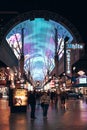 Las Vegas, USA - december, 2019 Tourists outside the Pioneer watch the Freemont Street Experience light show Royalty Free Stock Photo