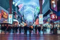 Las Vegas, USA - december, 2019 Tourists outside the Pioneer watch the Freemont Street Experience light show Royalty Free Stock Photo