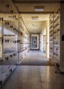 Urns with ashes in a columbarium wall