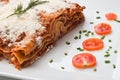 Lasagna with cherry tomatoes presentation