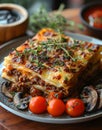 Lasagna with minced meat mushrooms and cheese on plate Royalty Free Stock Photo