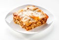 Lasagna piece plate  close-up on white background Royalty Free Stock Photo