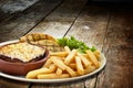 Lasagne Verdi with chips and side salad and garlic bread Royalty Free Stock Photo