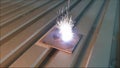 Laser beam engraves a spiral on Titanium plate video