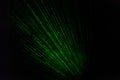 Laser beams in dark. Green rays on black background. Light music bright color Royalty Free Stock Photo