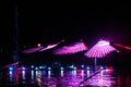 Laser beams during a public show in several colors at the water of the Ringvaart in Nieuwerkerk aan den IJssel