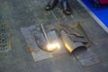 Laser cleaning of metal. The laser beam cleans the metal surface from rust.