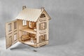 Laser cut doll house with small furniture made of plywood details Royalty Free Stock Photo