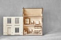 Laser cut doll house with small furniture made of plywood details Royalty Free Stock Photo