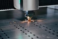 laser cutting mashine CNC with flying sparks