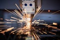 Laser cutting. Metal machining with sparks on CNC laser engraving maching Royalty Free Stock Photo