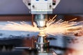 Laser cutting. Metal machining with sparks Royalty Free Stock Photo