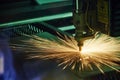 Laser cutting. Metal machining with sparks Royalty Free Stock Photo