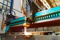 Cutting metal processing technology. Laser cutting of metal sheet with sparks Royalty Free Stock Photo