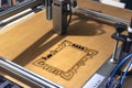 Laser engraving and cutting, using reclaimed wood, upcycling concept Royalty Free Stock Photo
