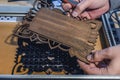 Laser engraving and cutting, using reclaimed wood, upcycling concept Royalty Free Stock Photo