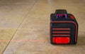 Laser level on the floor. design and measurement concept Royalty Free Stock Photo