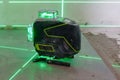 the laser level marks the lines for marking on the construction site Royalty Free Stock Photo