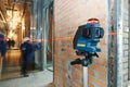 Laser level measurement at construction site Royalty Free Stock Photo