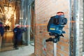 Laser level measurement at construction site