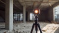 Laser level on tripod in construction site Royalty Free Stock Photo