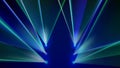 Laser light show. Bright led laser beams, dj light party. Illuminated blue green stage, led strobe lights. Stage lighting effect.