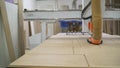 Woodworking CNC machine in a furniture factory. Machine for cutting MDF. Furniture manufacturing process. Laser machine for the